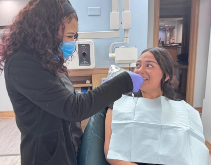 dental assistant students training in a dental office