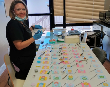 dental assistant student studying table filled with dental tools